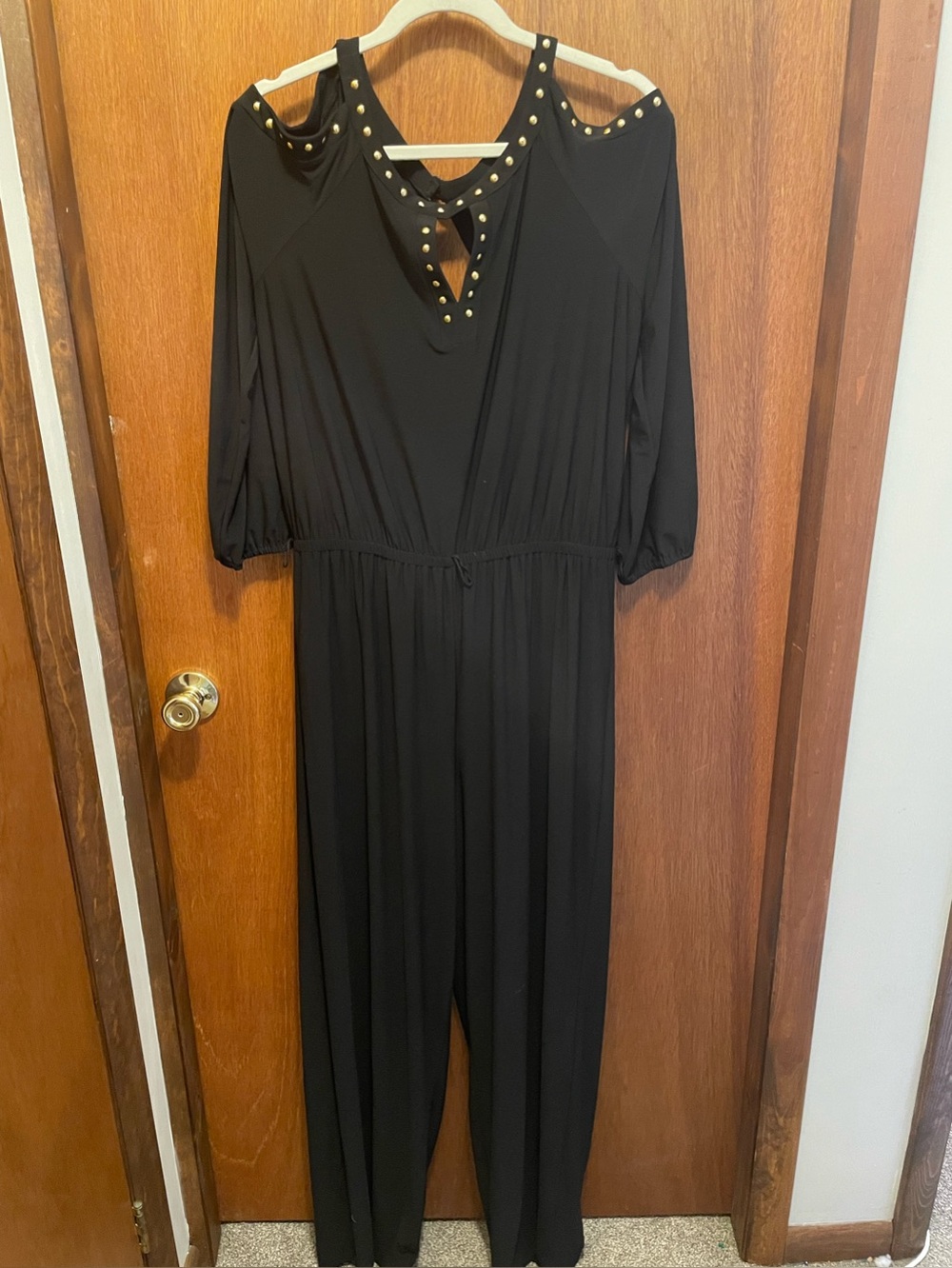 Emma & Michelle Black studded jumpsuit w/ cold shoulder
